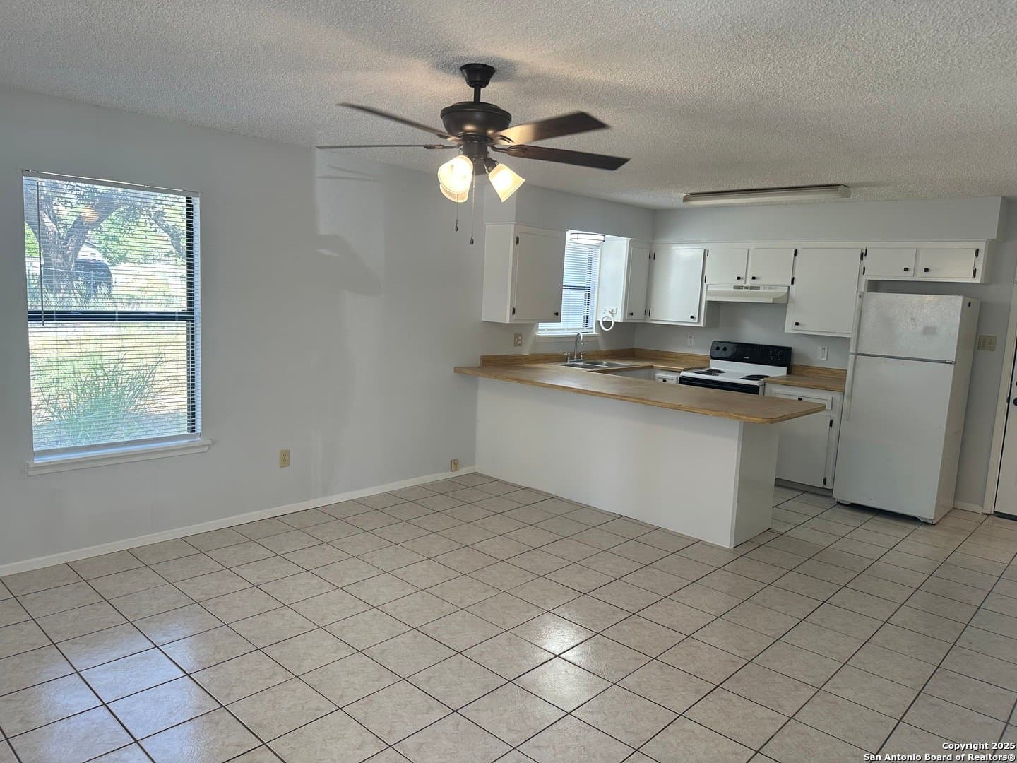 Pleasanton House: 401 W Adams