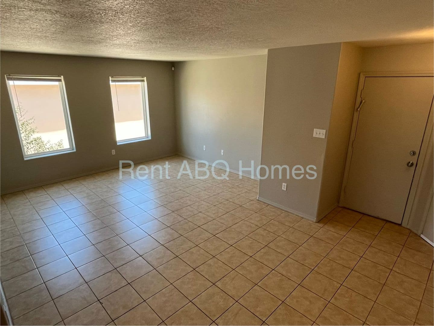Albuquerque House: 9643 El Patron Rd. SW