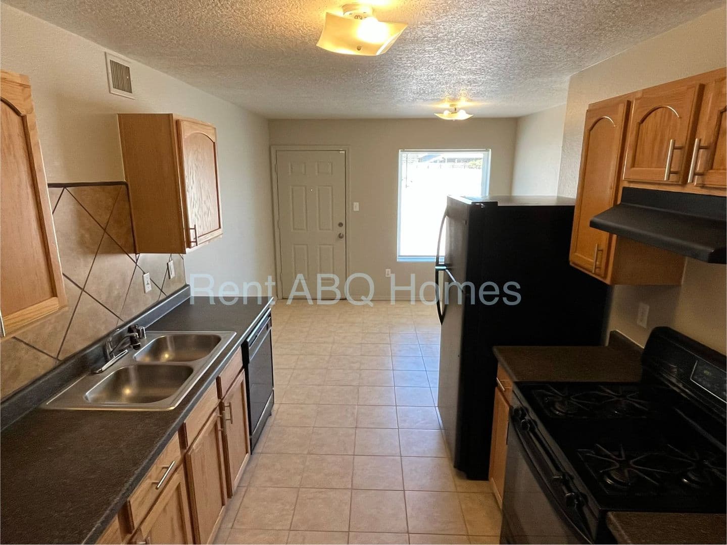 Albuquerque House: 9643 El Patron Rd. SW