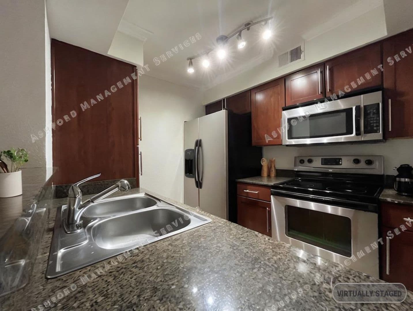Phoenix Condo: 2025 E. Campbell Ave #142