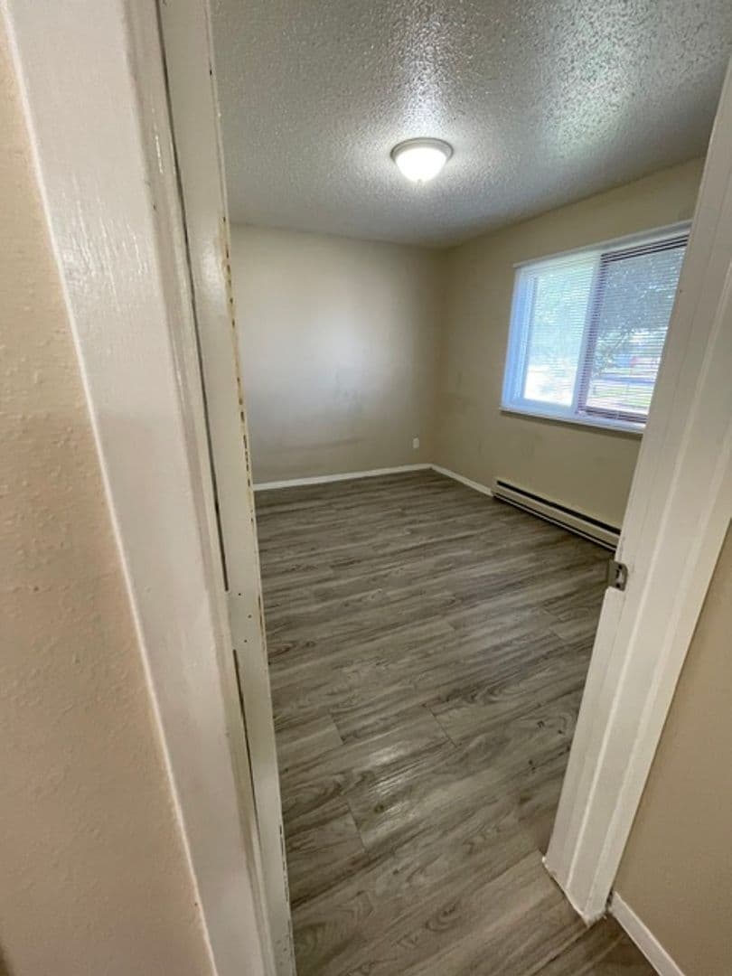 Williston Apartment: 2706, 2802, and 2820 17th Avenue W and 1608 26th Street West