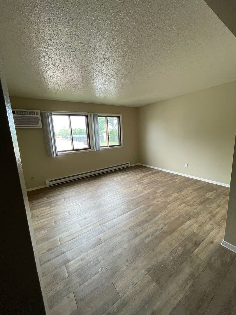Williston Apartment: 2706, 2802, and 2820 17th Avenue W and 1608 26th Street West