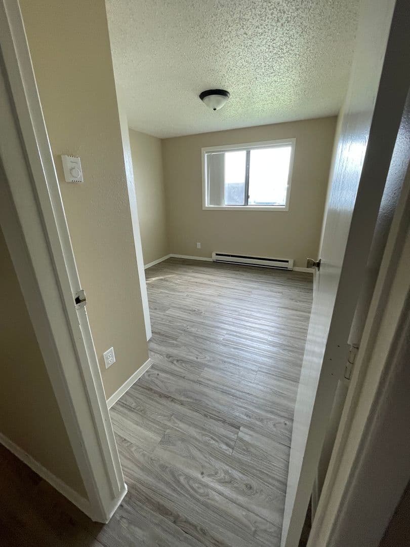 Williston Apartment: 2706, 2802, and 2820 17th Avenue W and 1608 26th Street West