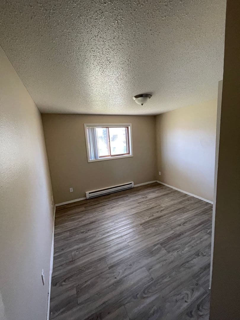 Williston Apartment: 2706, 2802, and 2820 17th Avenue W and 1608 26th Street West
