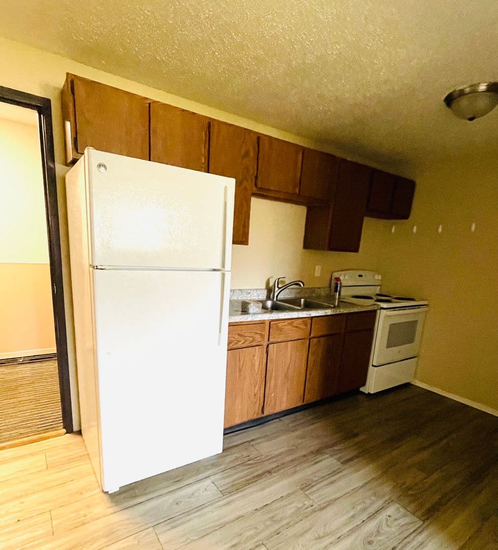 Williston Apartment: 2706, 2802, and 2820 17th Avenue W and 1608 26th Street West