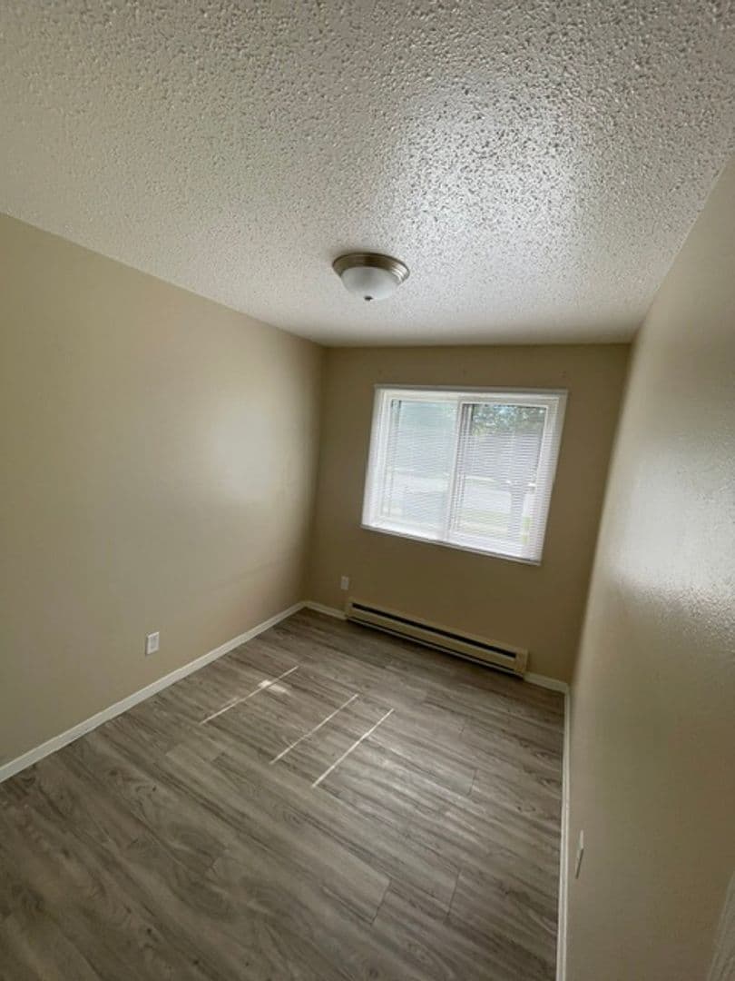 Williston Apartment: 2706, 2802, and 2820 17th Avenue W and 1608 26th Street West