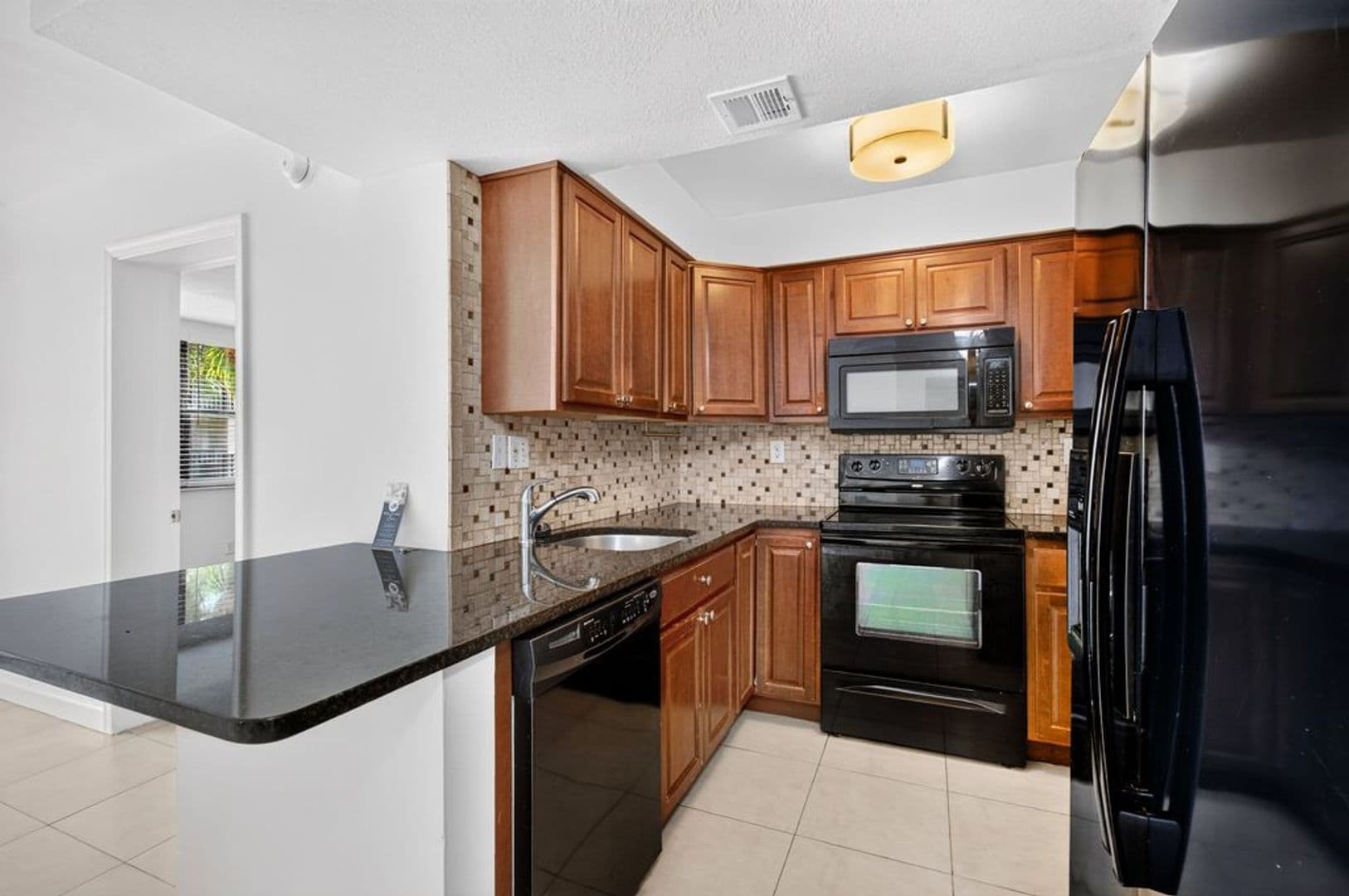West Palm Beach Condo: 706 Executive Center Dr., #24