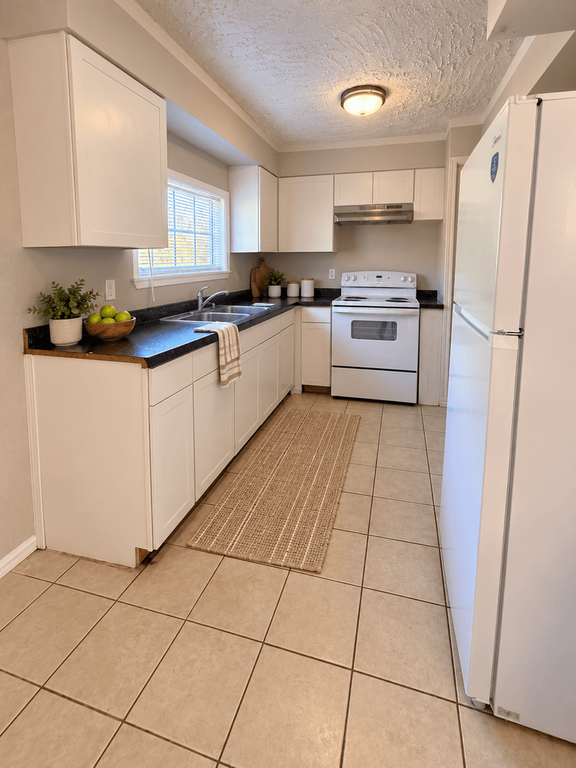 Tulsa House: 213 E 58th St N