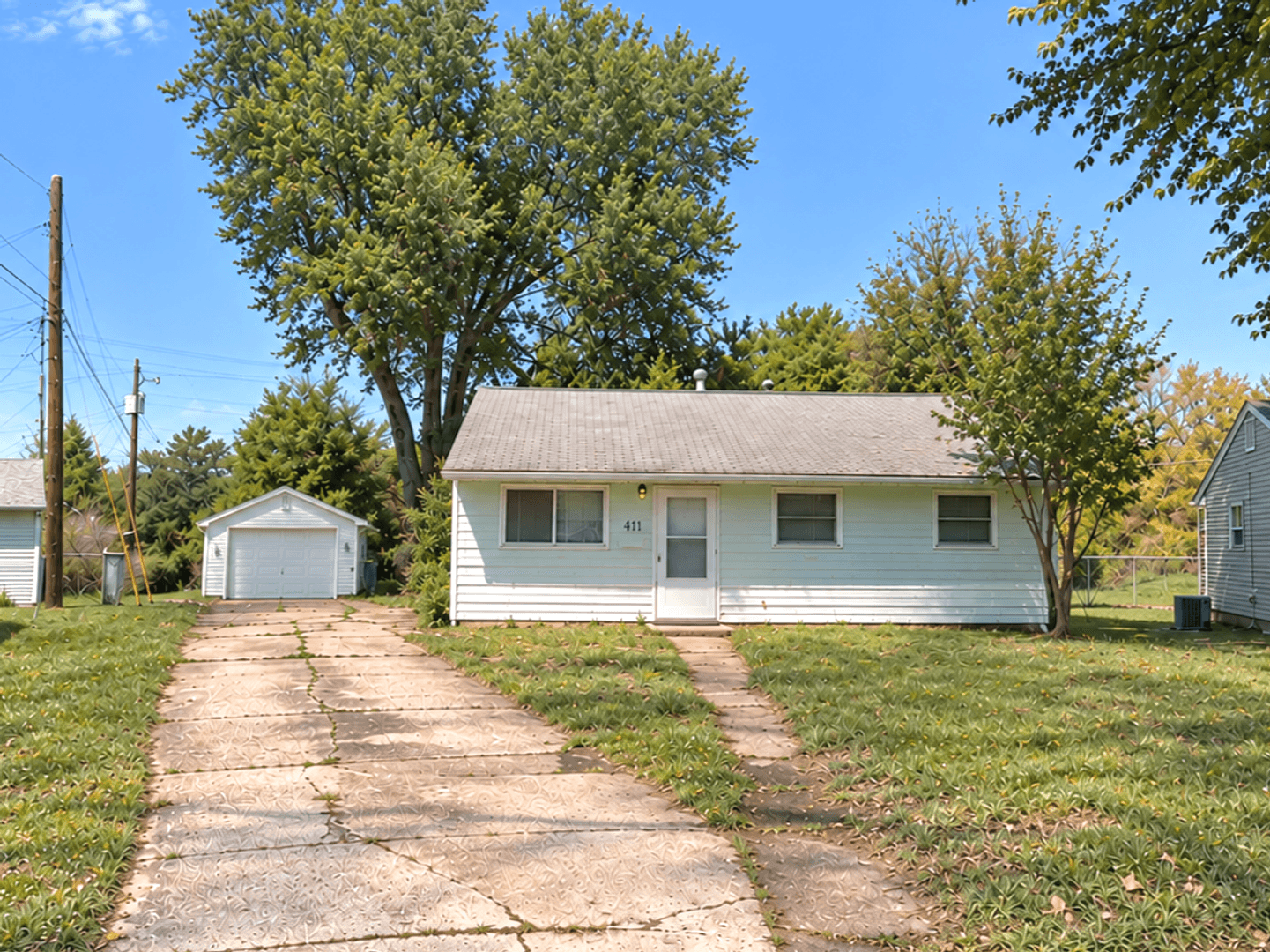 Milan House: 411 E 7th St. Ct