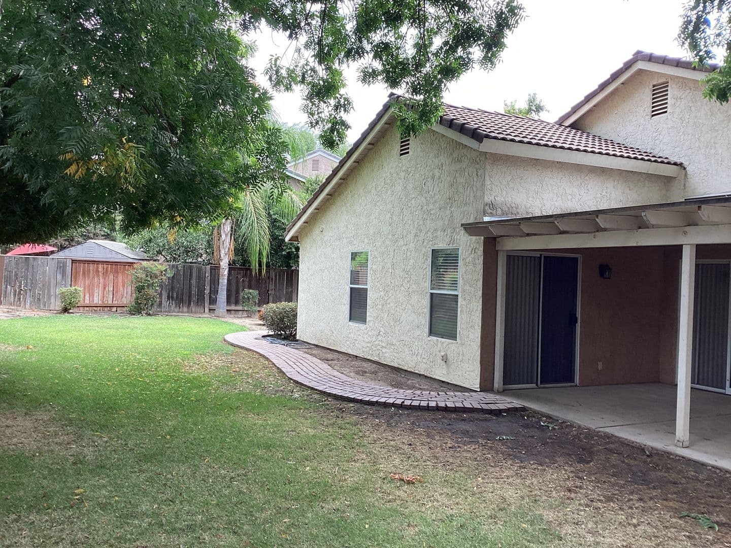 Fresno House: 9615 N Buttonwood Court