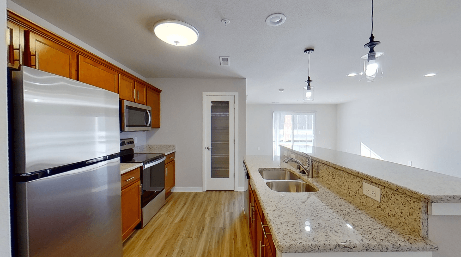 Slinger Apartment: 1904 American Eagle Drive