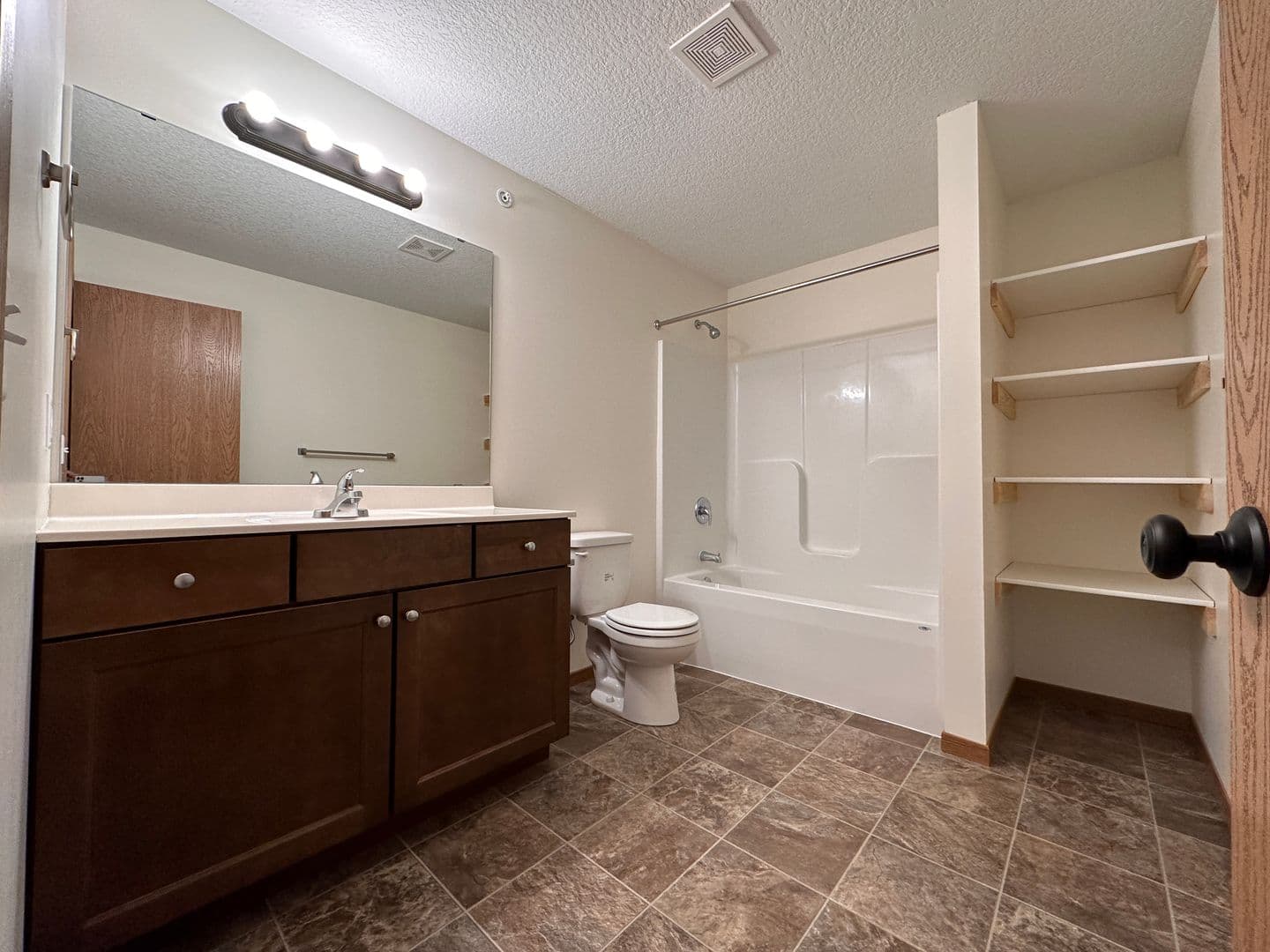 Faribault Apartment: 2805 Cardinal Ave. - 207
