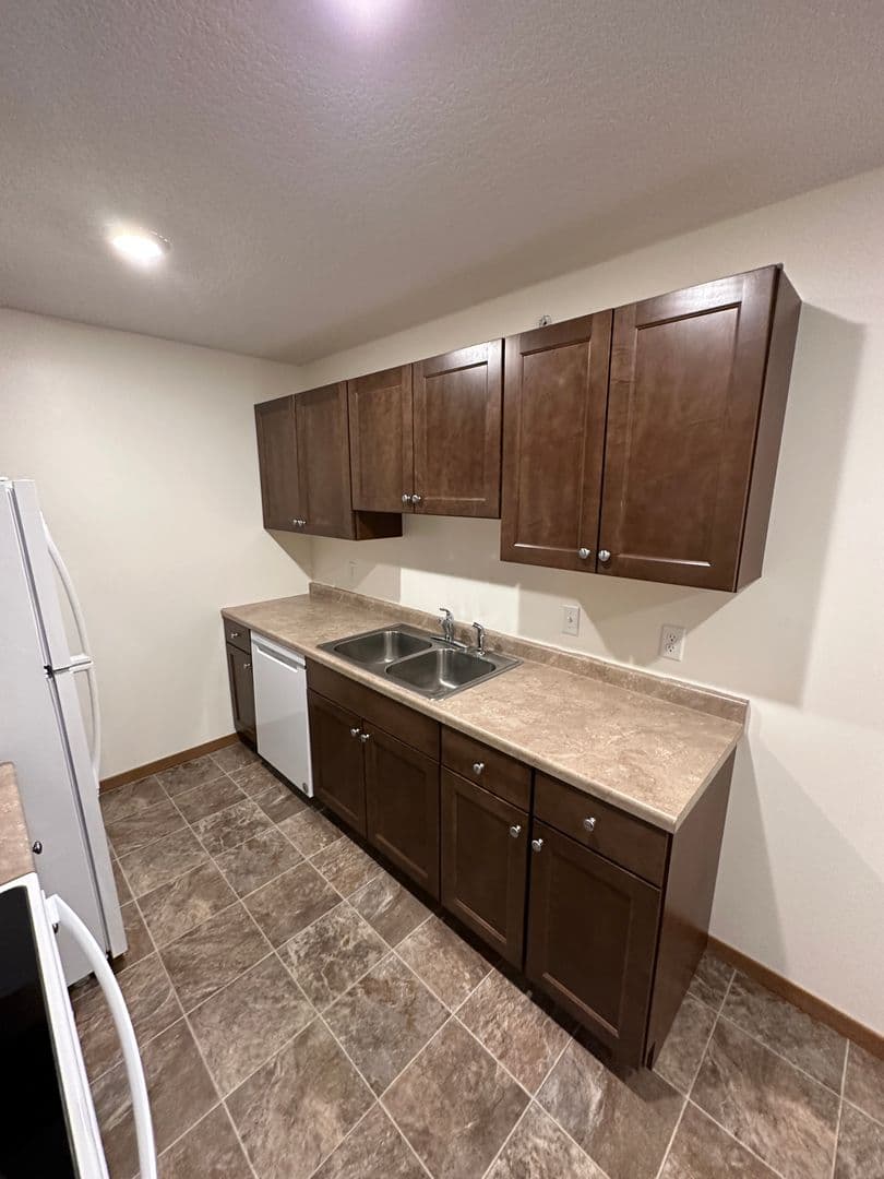 Faribault Apartment: 2805 Cardinal Ave. - 207