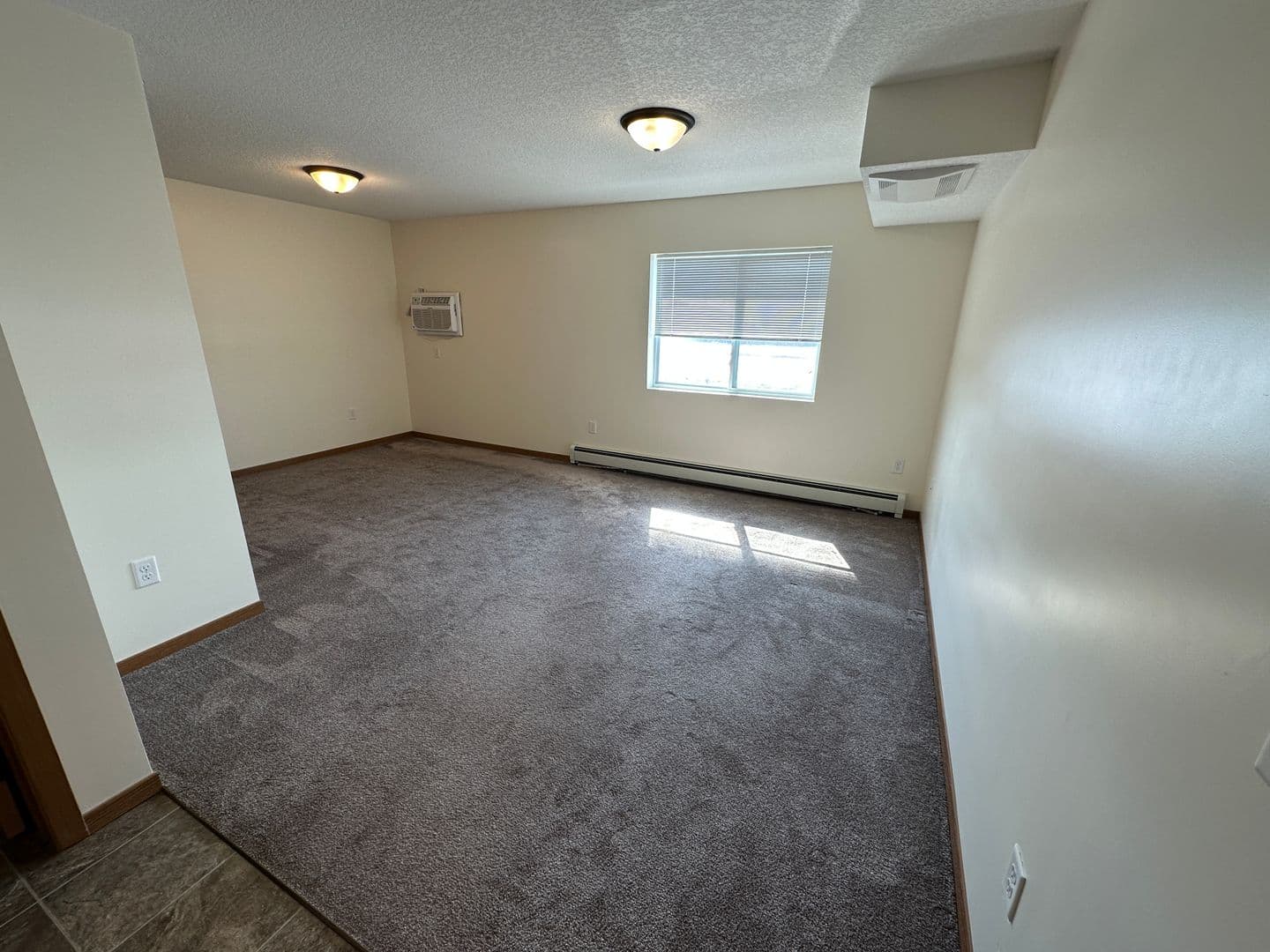 Faribault Apartment: 2805 Cardinal Ave. - 207