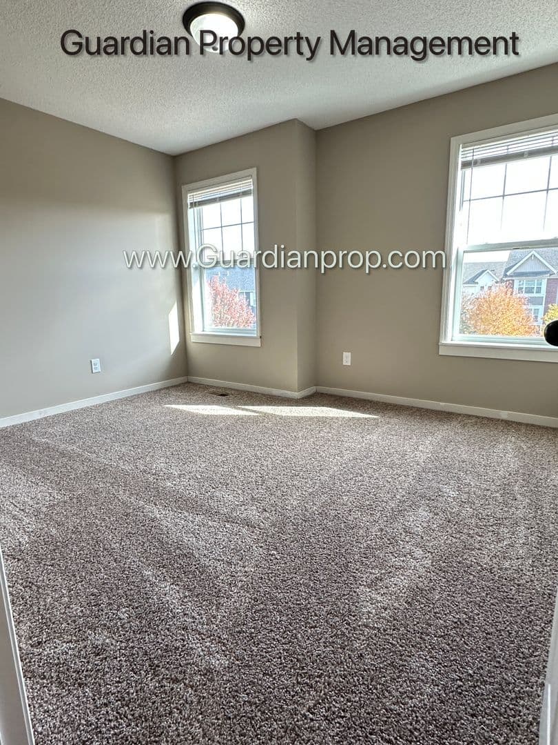 Champlin Townhome: 11942 Emery Village Drive N