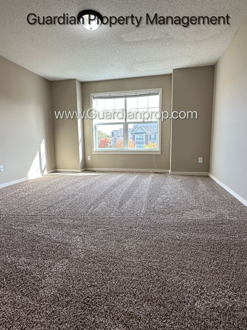 Champlin Townhome: 11942 Emery Village Drive N