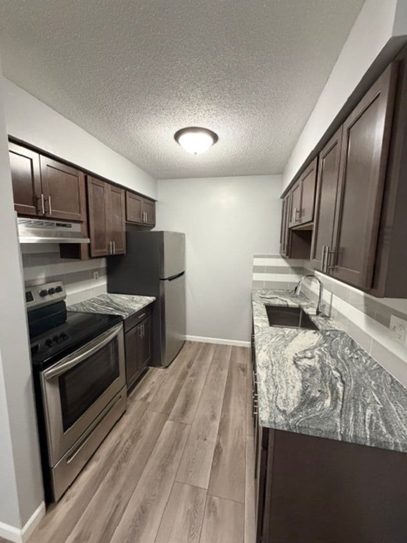 Walled Lake Apartment: 1250 E West Maple Rd