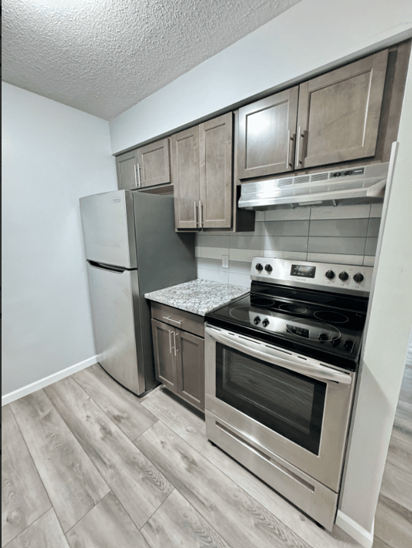 Walled Lake Apartment: 1250 E West Maple Rd