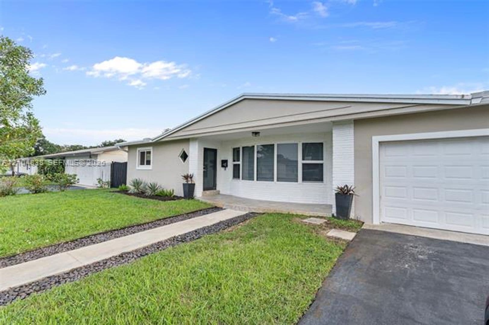 Plantation House: 5250 SW 4th Ct # 5250