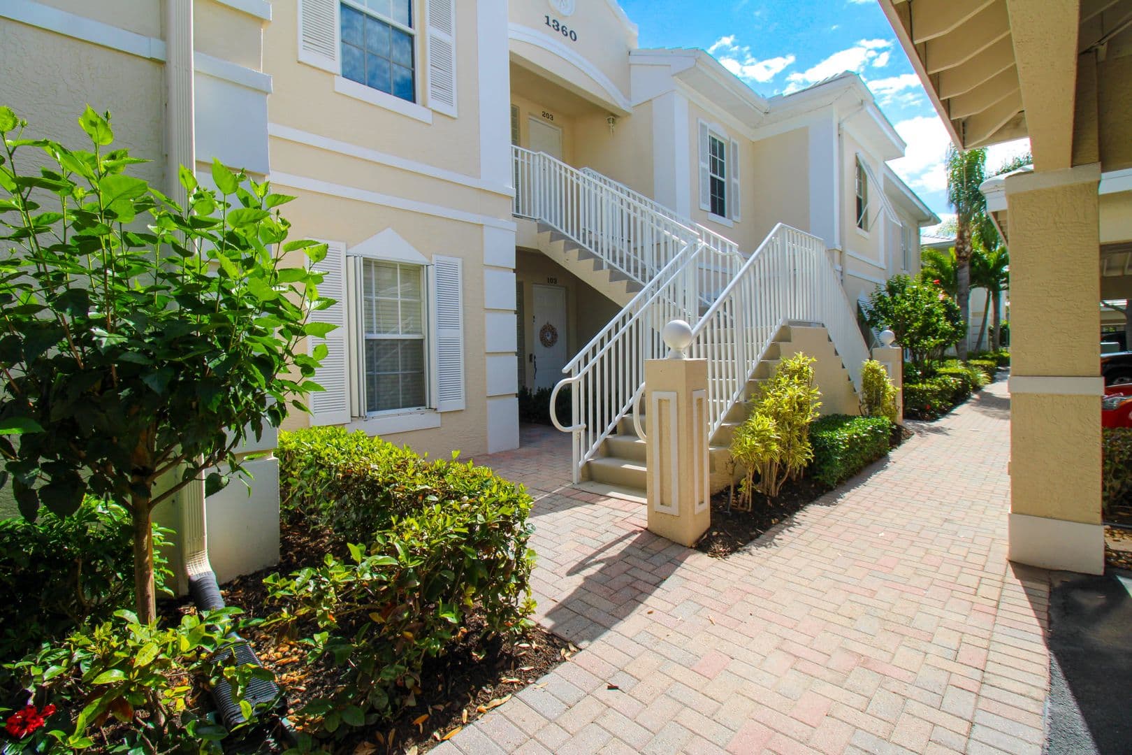 Naples House: 1360 Sweetwater CV Unit#202