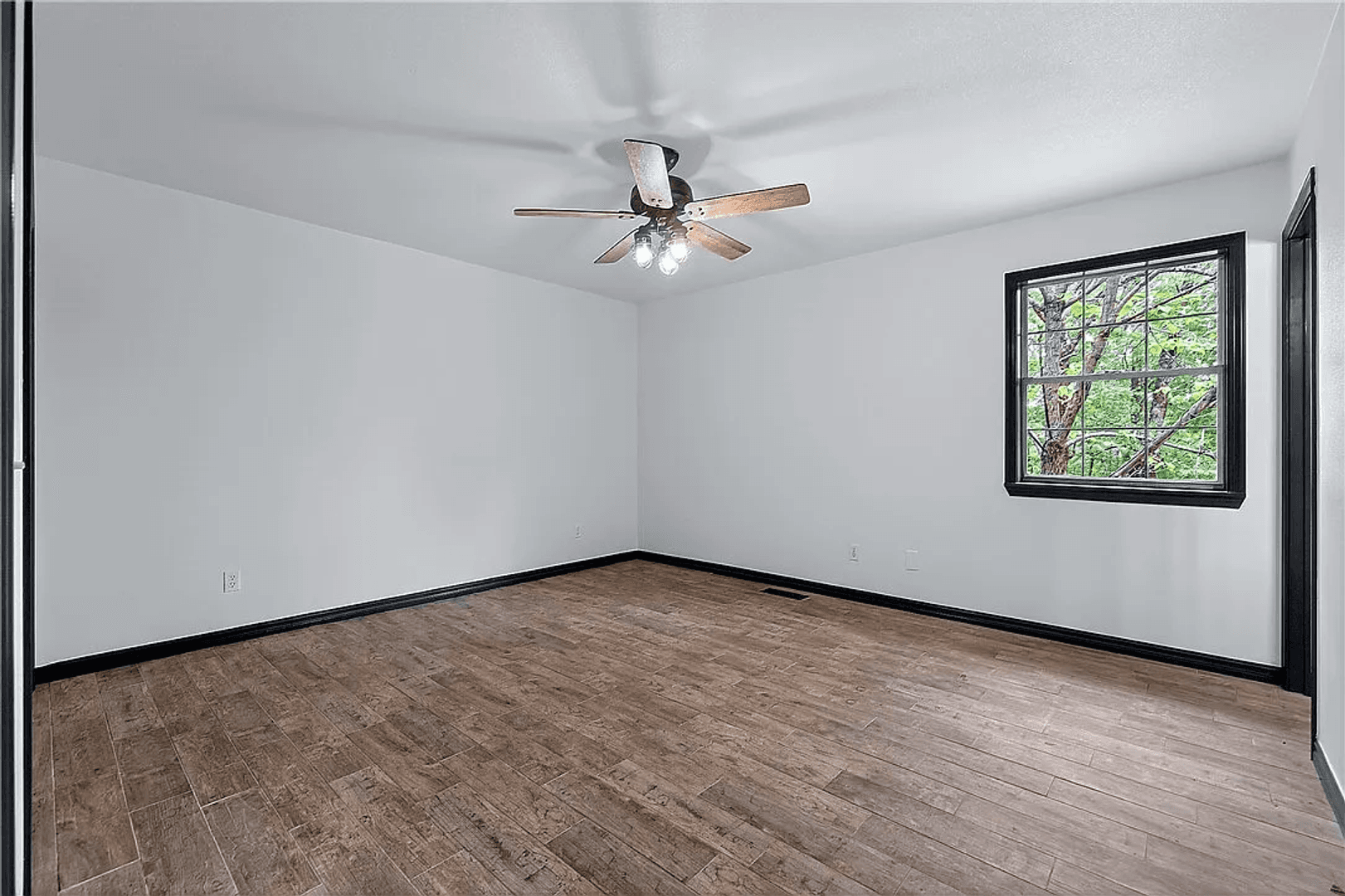 Rogers House: 8517 Spruce Dr.