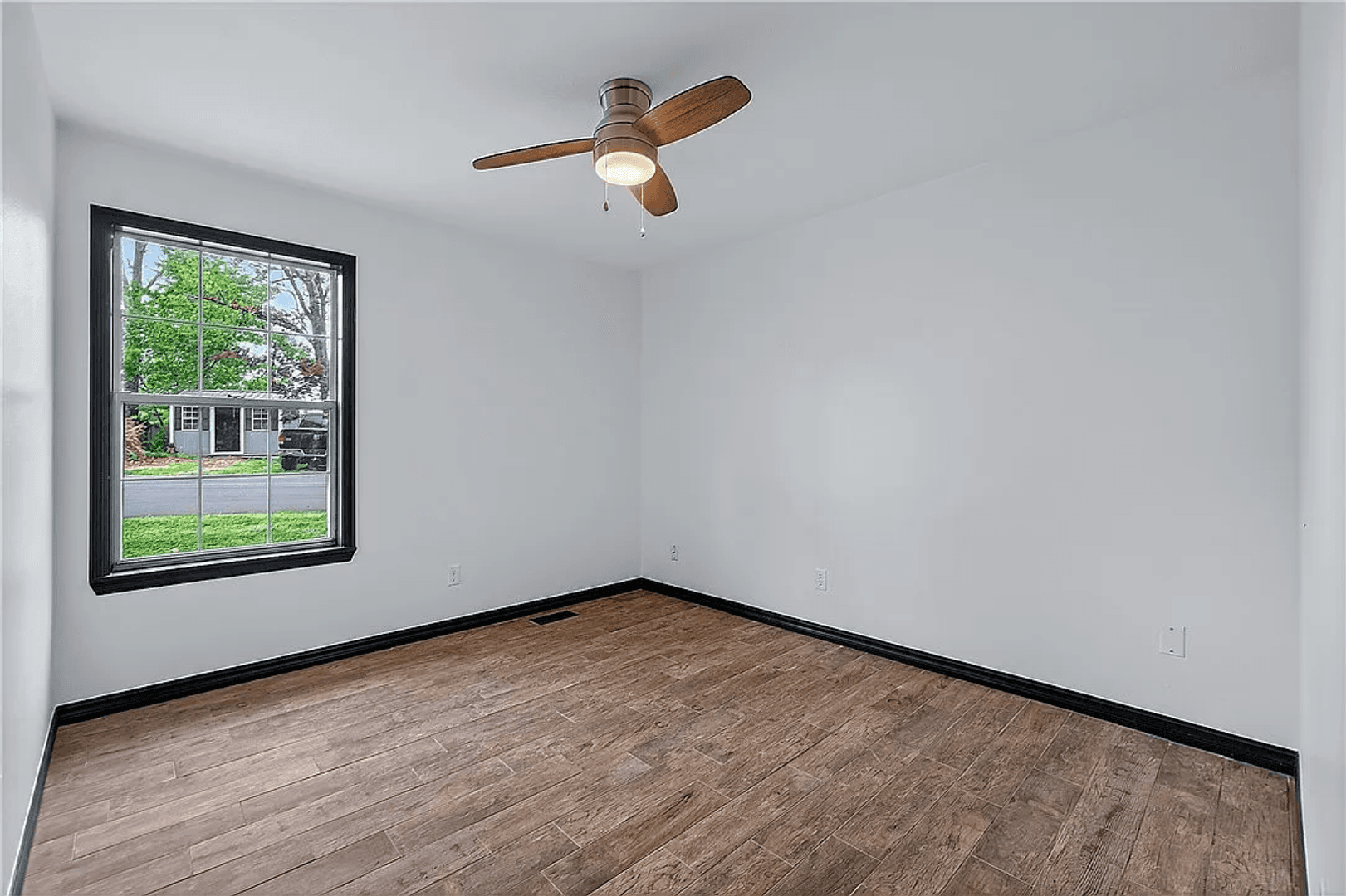 Rogers House: 8517 Spruce Dr.