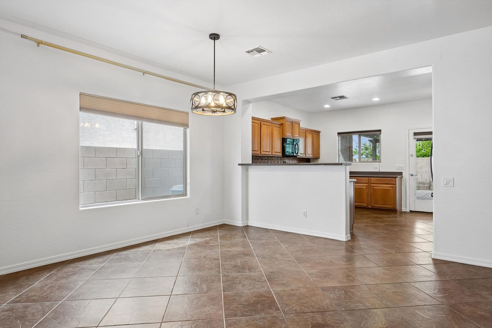 Mesa House: 11130 E Serafina Ave