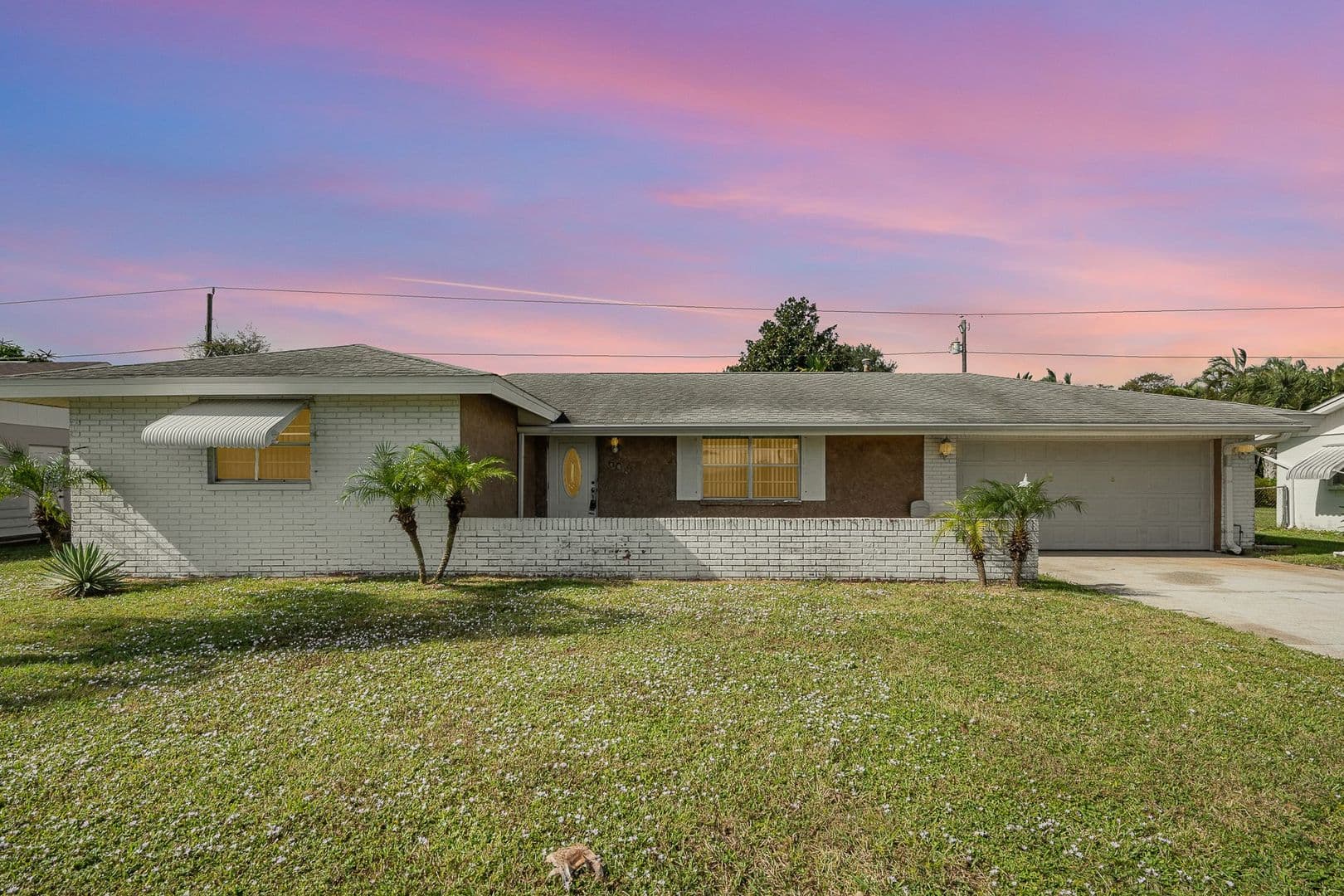 Melbourne House: 608 E. Sacre Coeur Dr.