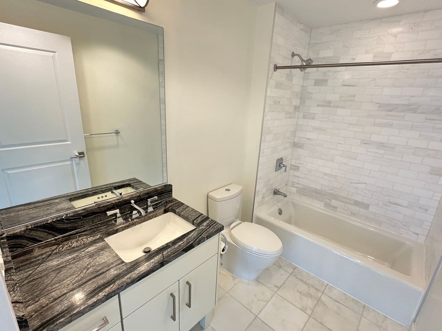 Bethesda Condo: 7171 Woodmont Ave #606-A