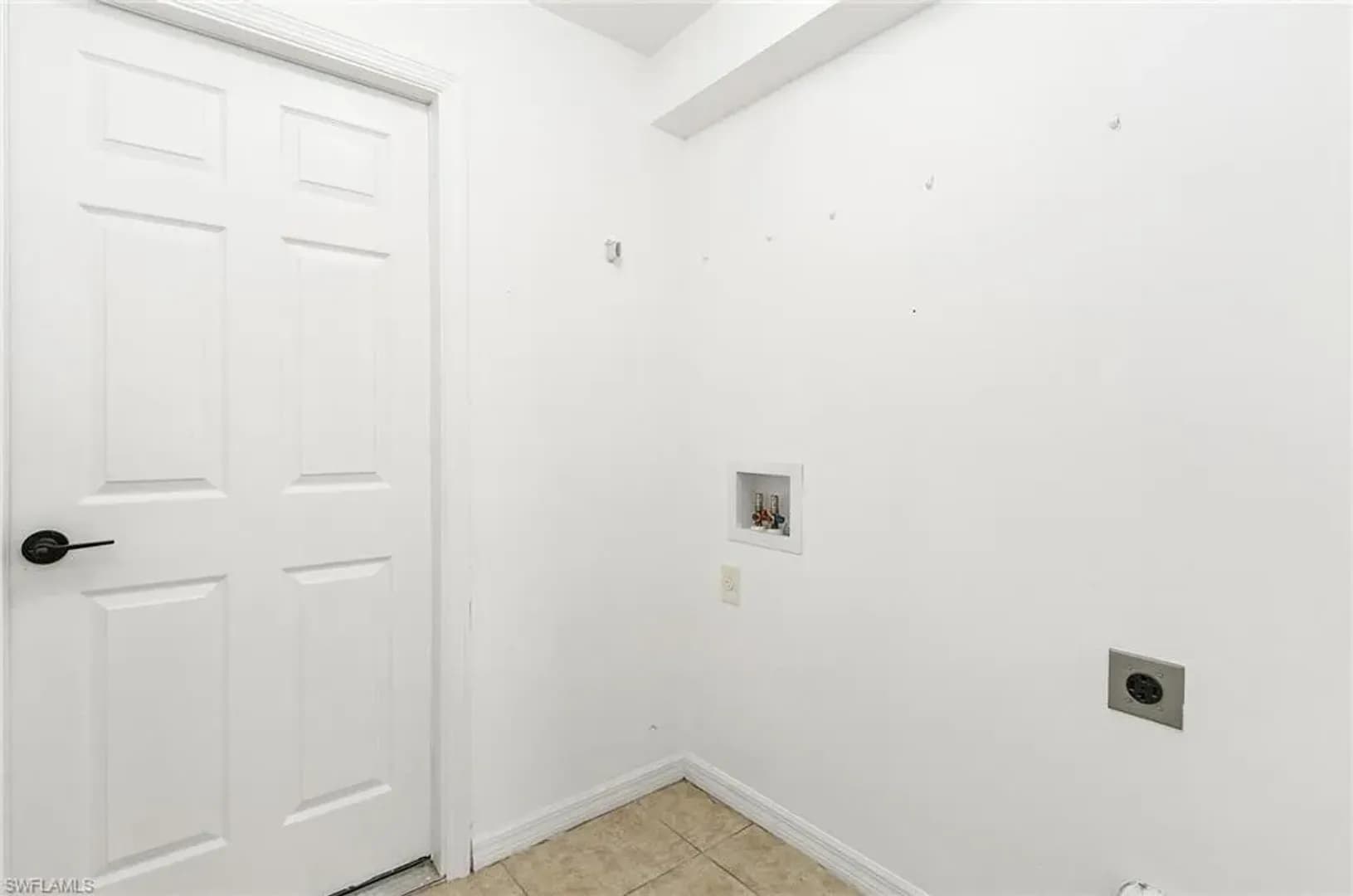 LEHIGH ACRES House: 306 SHADOW LAKES DR