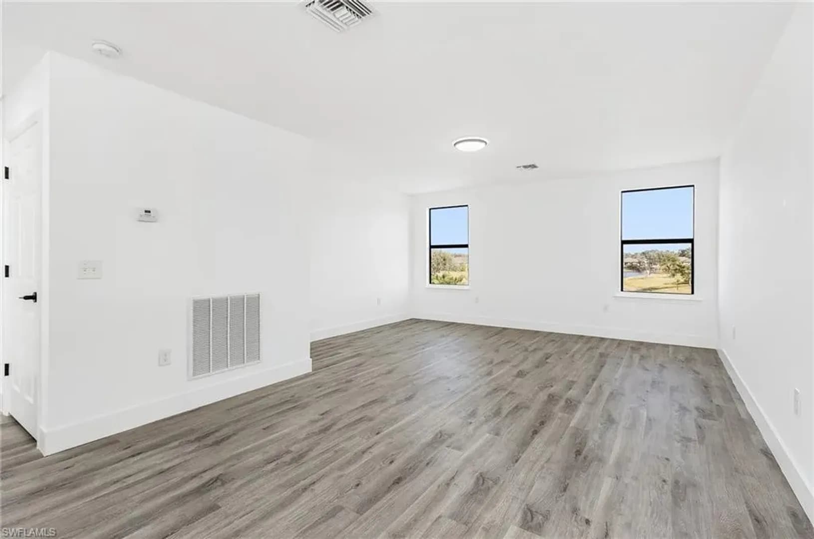 LEHIGH ACRES House: 306 SHADOW LAKES DR