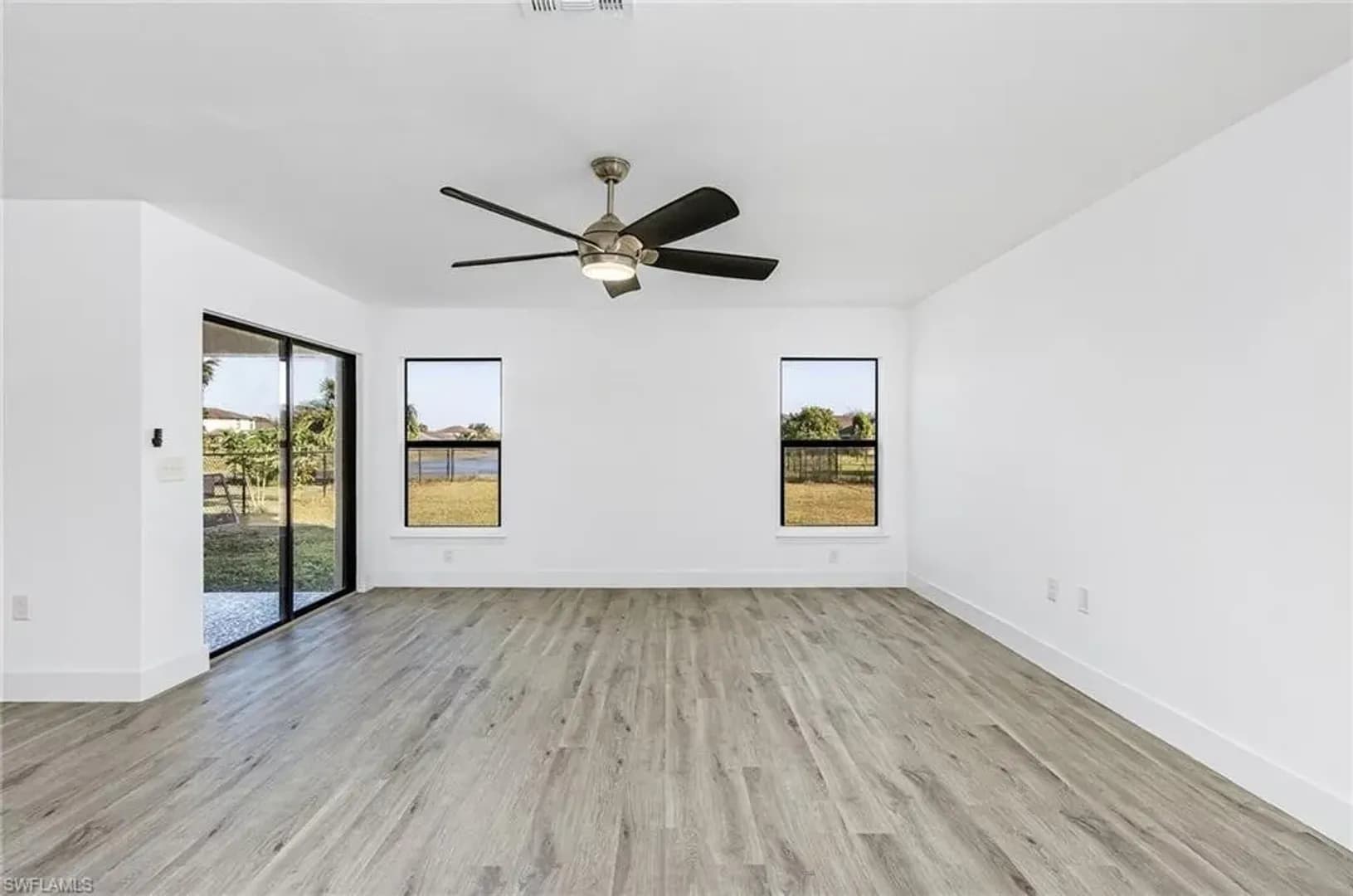 LEHIGH ACRES House: 306 SHADOW LAKES DR