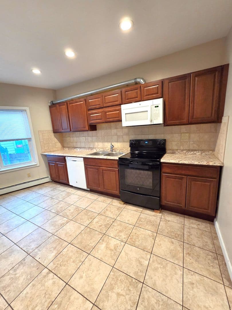 Cranston Apartment: 1340 Cranston Street, 1st Floor Rear