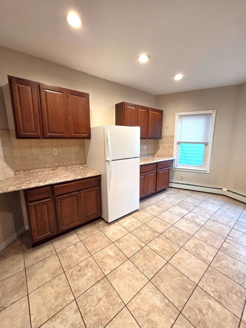 Cranston Apartment: 1340 Cranston Street, 1st Floor Rear