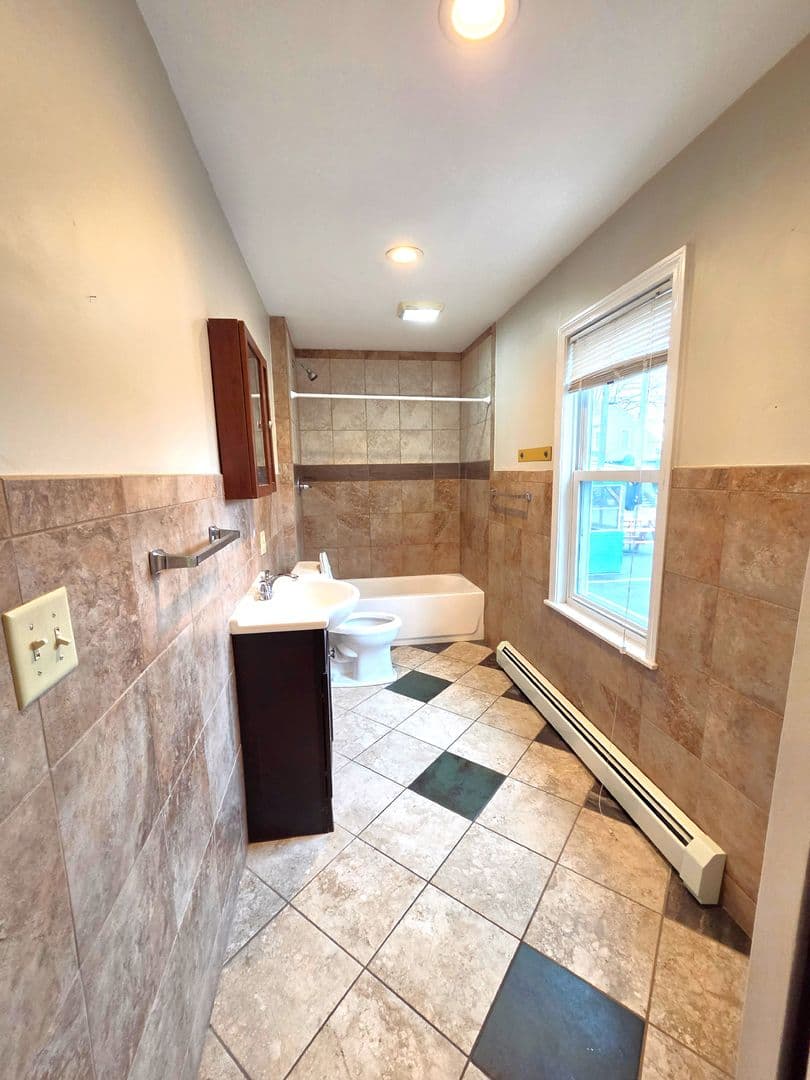 Cranston Apartment: 1340 Cranston Street, 1st Floor Rear