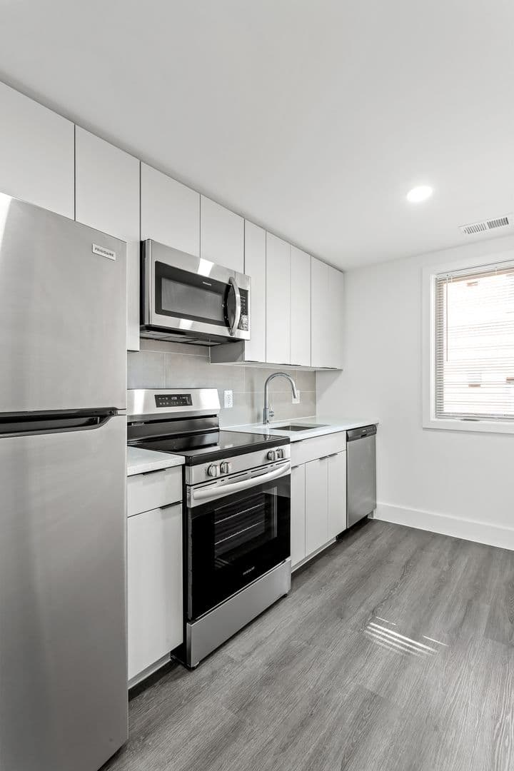 Washington Apartment: 6701 & 6707 14th Street, NW  and 1400 & 1401 Whittier Place, NW