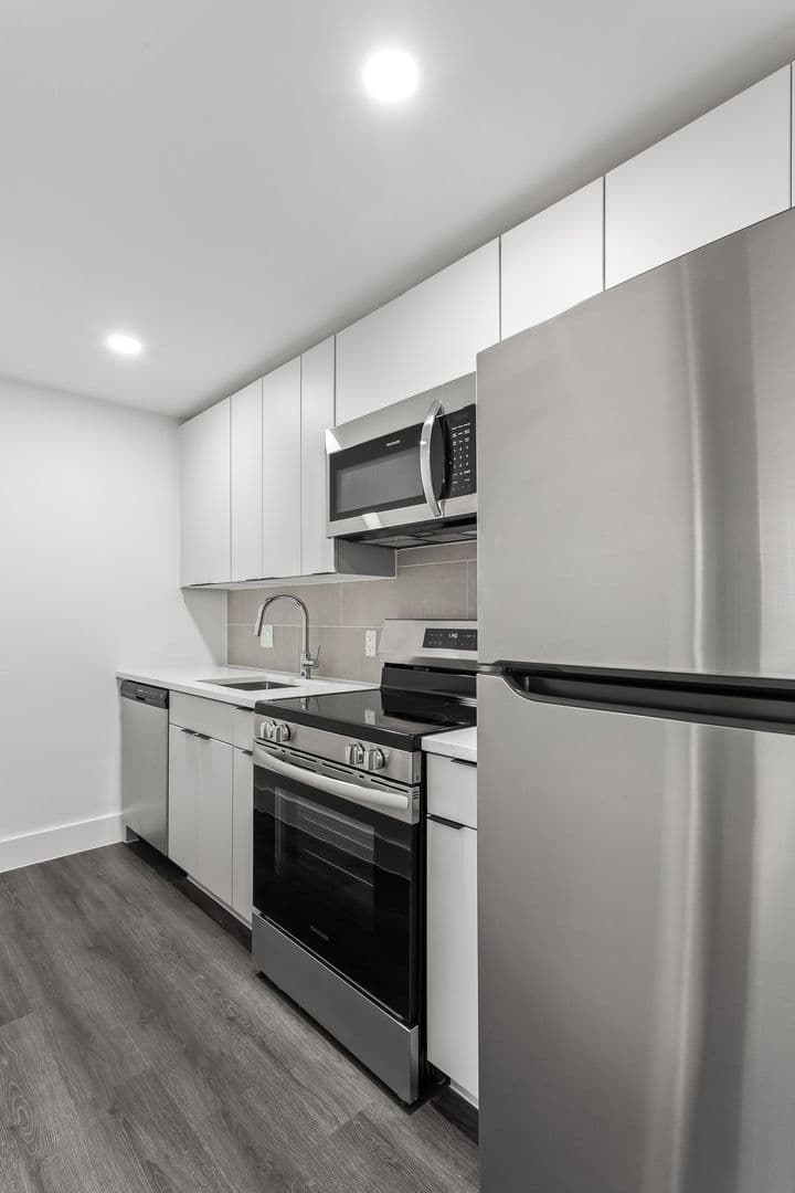 Washington Apartment: 6701 & 6707 14th Street, NW  and 1400 & 1401 Whittier Place, NW