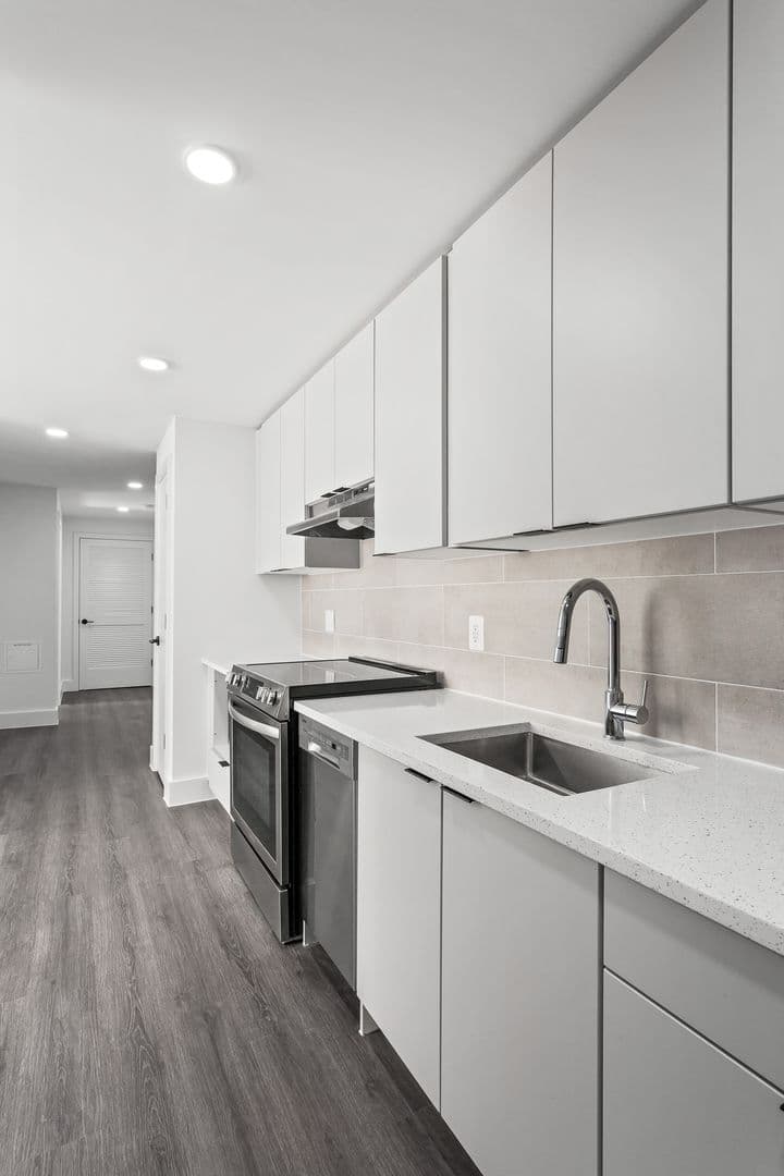 Washington Apartment: 6701 & 6707 14th Street, NW  and 1400 & 1401 Whittier Place, NW