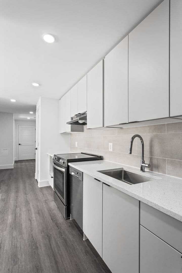 Washington Apartment: 6701 & 6707 14th Street, NW  and 1400 & 1401 Whittier Place, NW