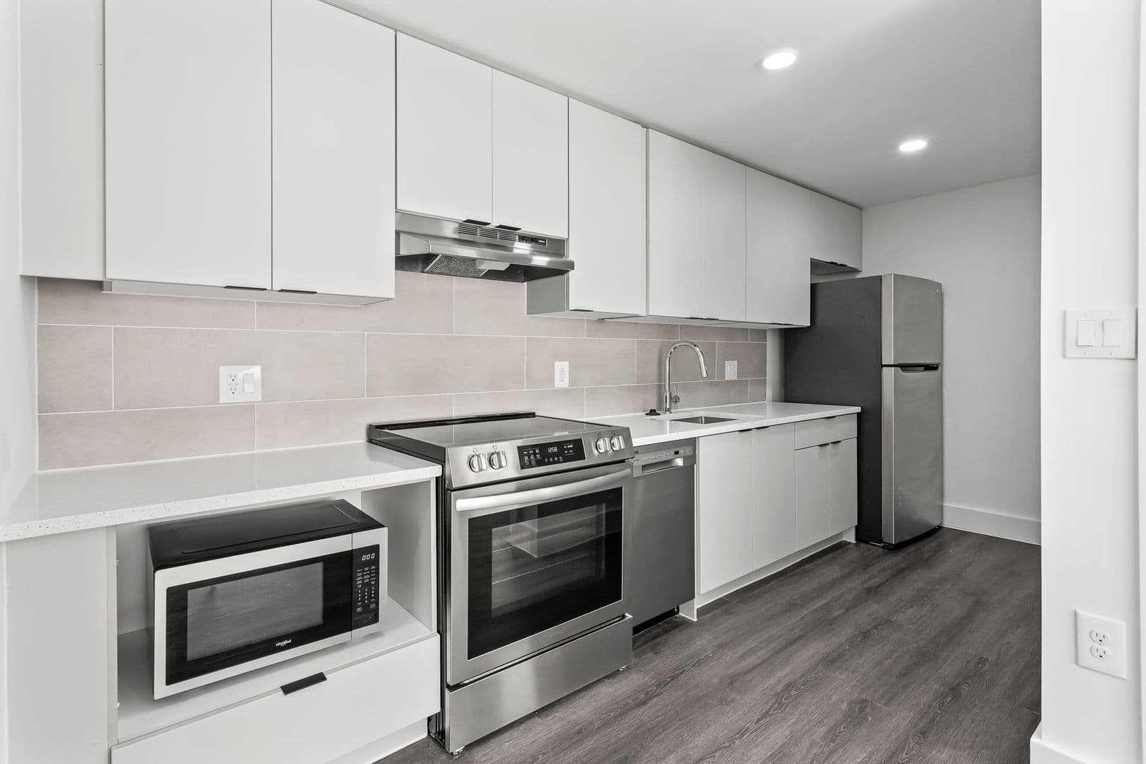Washington Apartment: 6701 & 6707 14th Street, NW  and 1400 & 1401 Whittier Place, NW