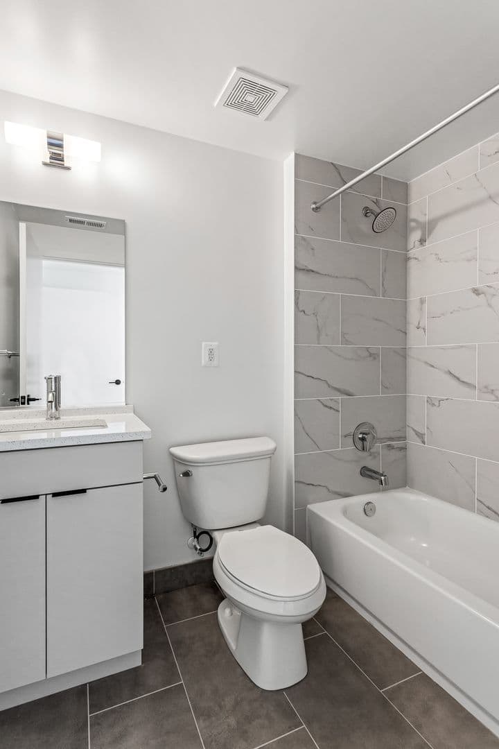 Washington Apartment: 6701 & 6707 14th Street, NW  and 1400 & 1401 Whittier Place, NW