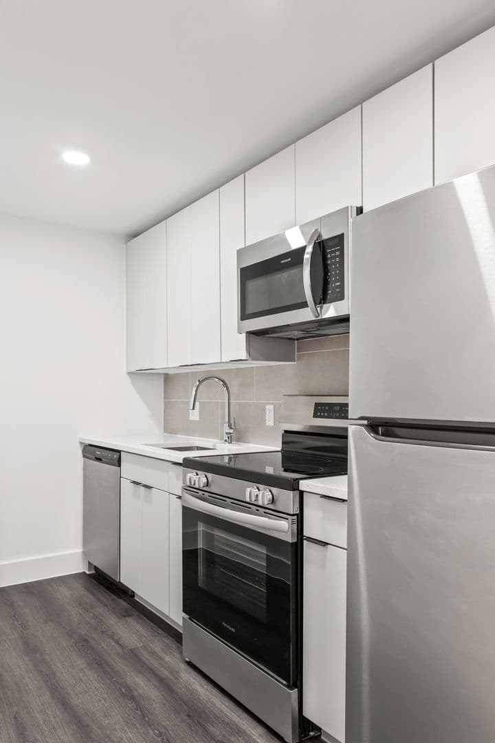 Washington Apartment: 6701 & 6707 14th Street, NW  and 1400 & 1401 Whittier Place, NW
