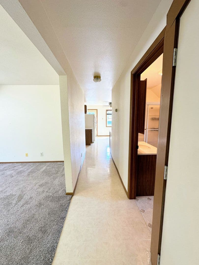 Two Rivers Apartment: 2212 School St.