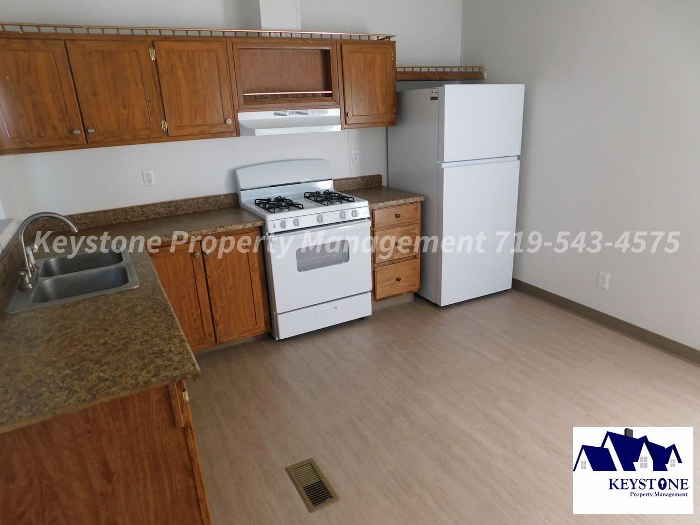 Pueblo House: 2624 Lowell Avenue