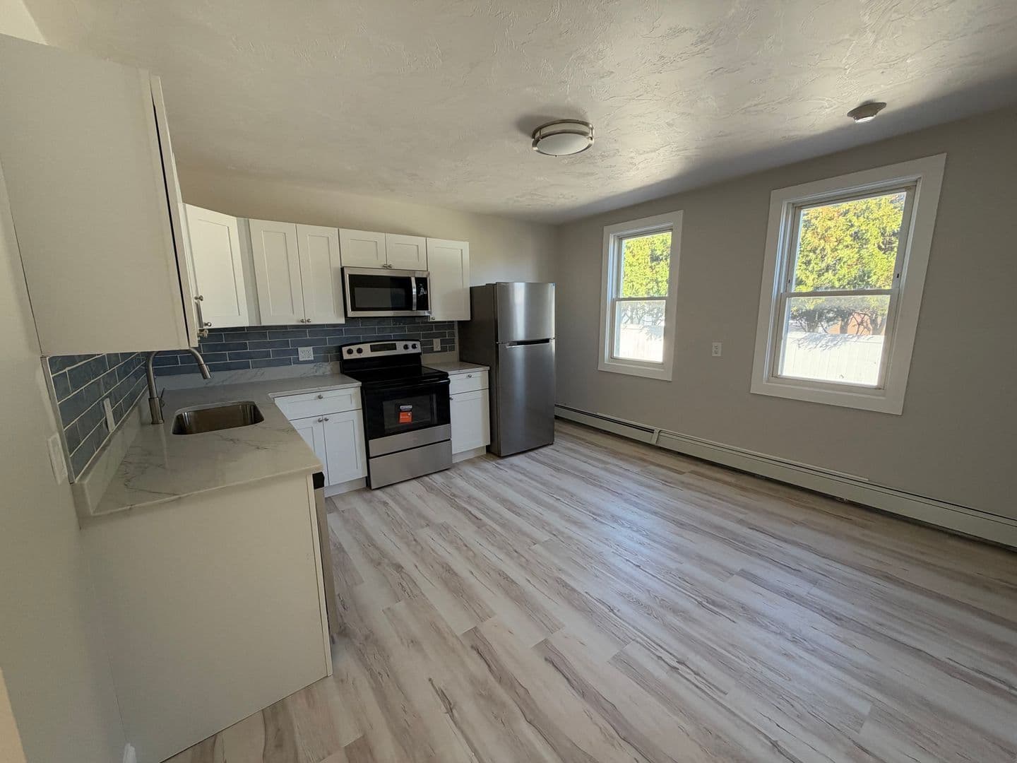 Manville Apartment: 15 Spring St