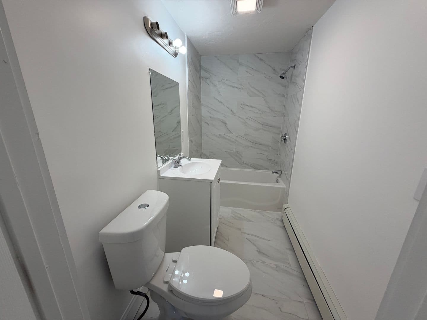 Manville Apartment: 15 Spring St