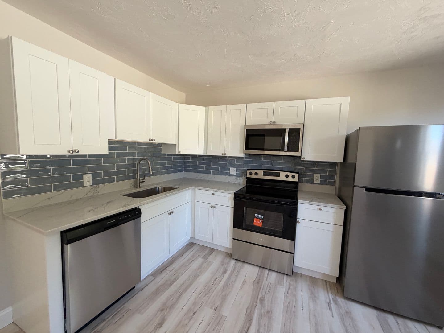 Manville Apartment: 15 Spring St