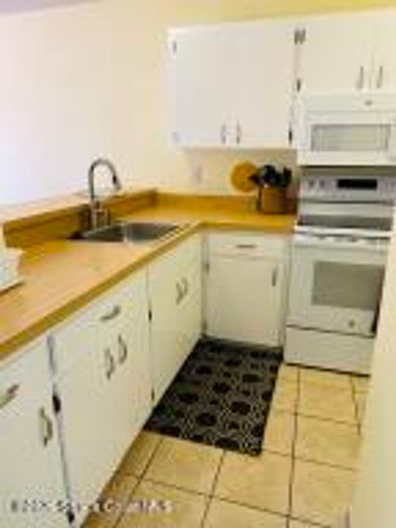 Palm Bay Townhome: 1011 Abada Ct NE