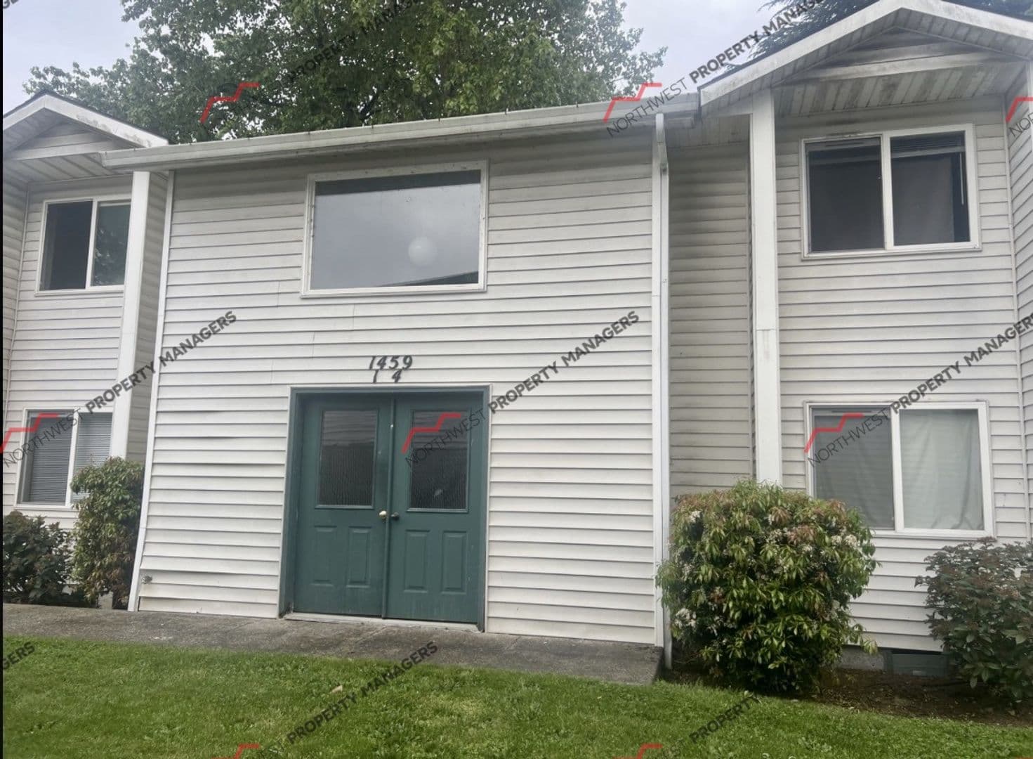 Woodland Apartment: 1451-1455-1459 N Goerig St.