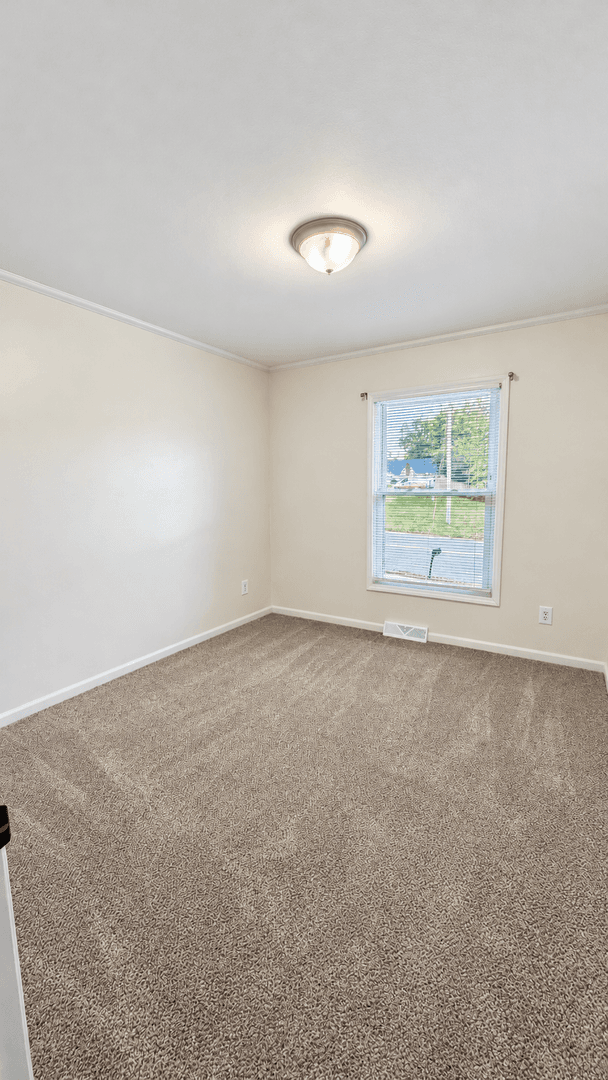 Blue Springs House: 409 NE Duncan Rd